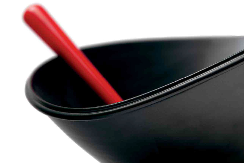 A black ceramic bowl by artist Prue Venables.