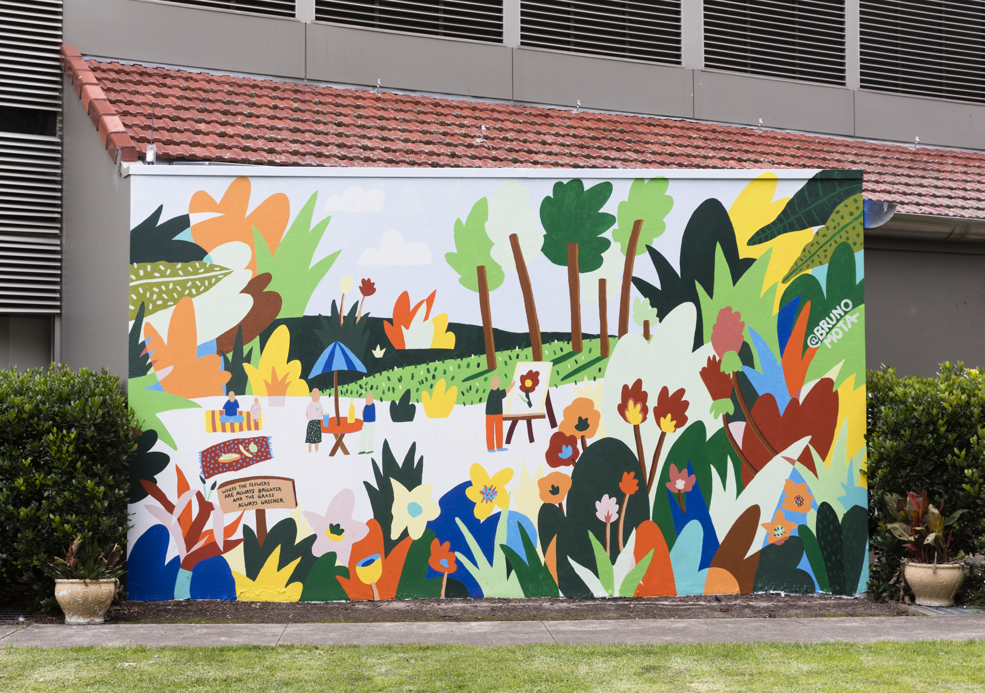 A large colourful outdoor mural inspired by Hazelhurst's outdoor spaces.
