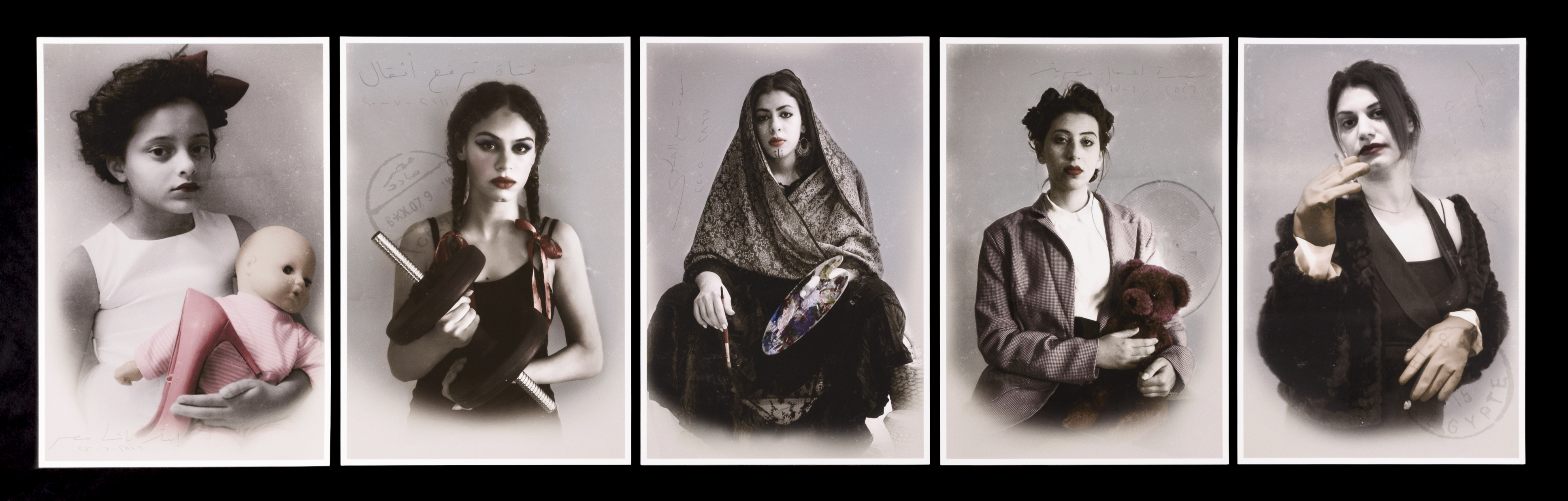 Photographic portraits of five Egyptian women.