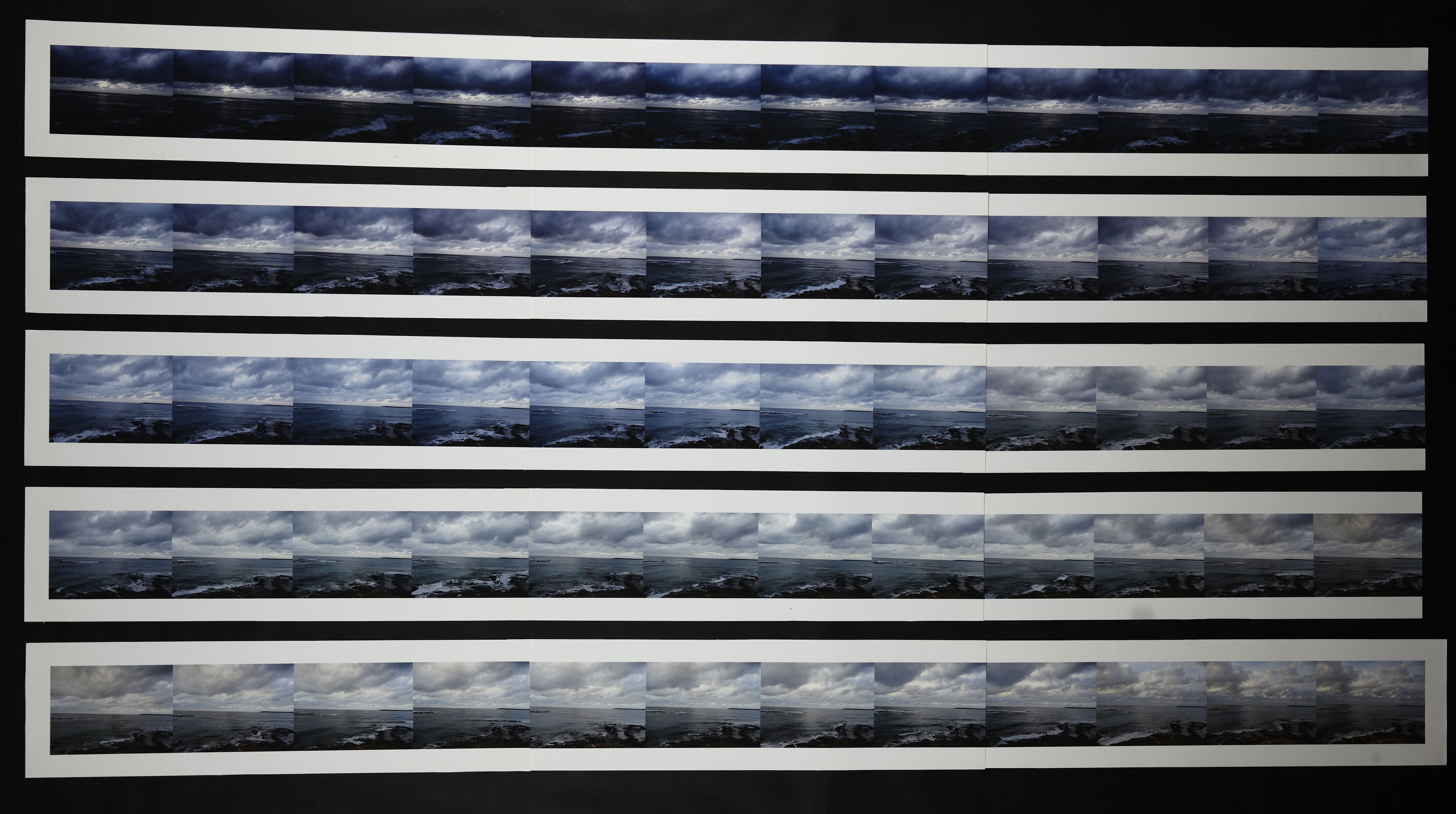 Five rows of repeating overlapping photographs of the ocean.