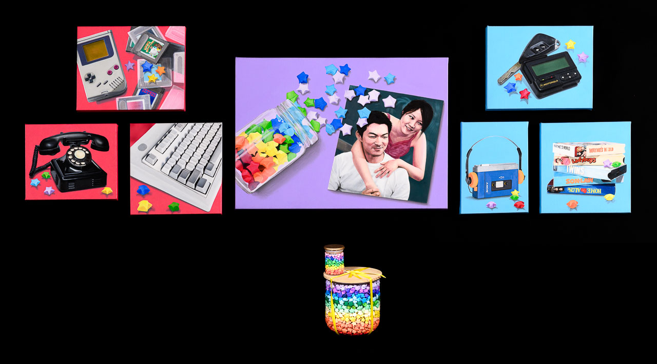A series of paintings of retro objects including a telephone, a Walkman and a computer keyboard and a portrait of a couple, accompanied by tow jars of colourful paper stars.