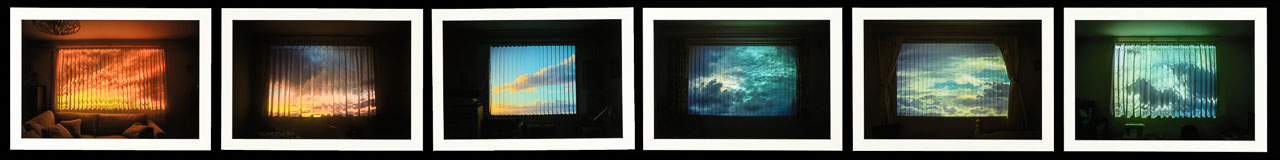A series of seven photographic images of the sky at different times of the day. The photographs have a rippled effect.