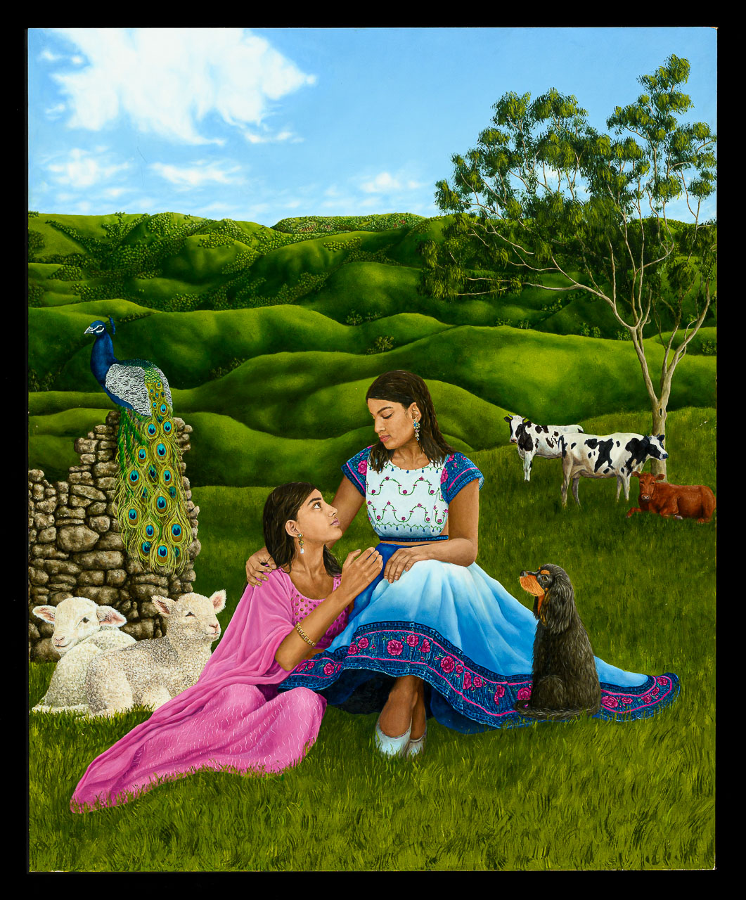 Two female figures sitting in a green field surrounded by farm animals. the figures are south Asian and are wearing traditional dress.