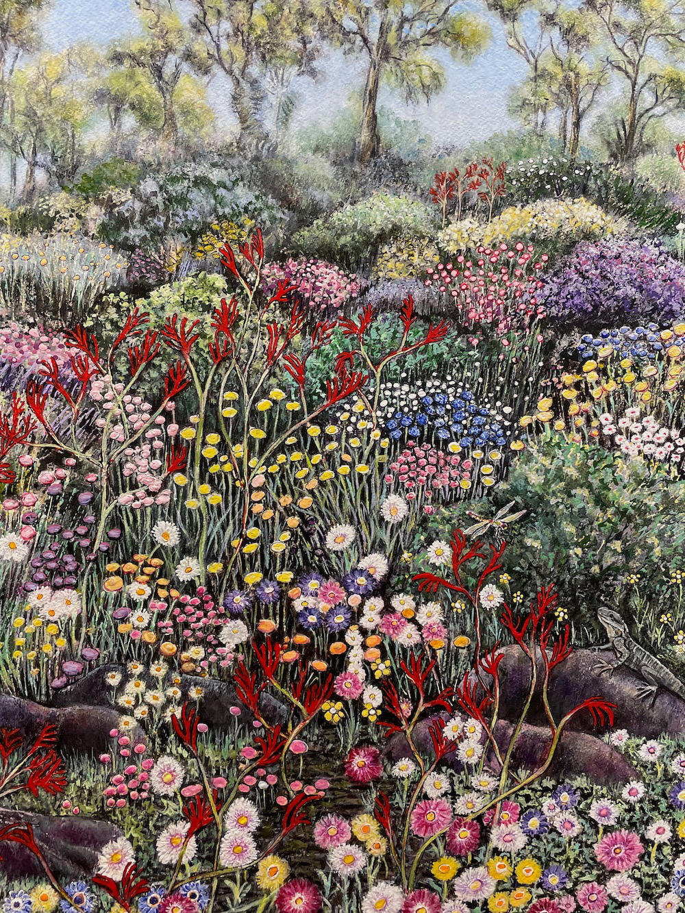 Painting of Australian bush landscape with many colourful flowers.