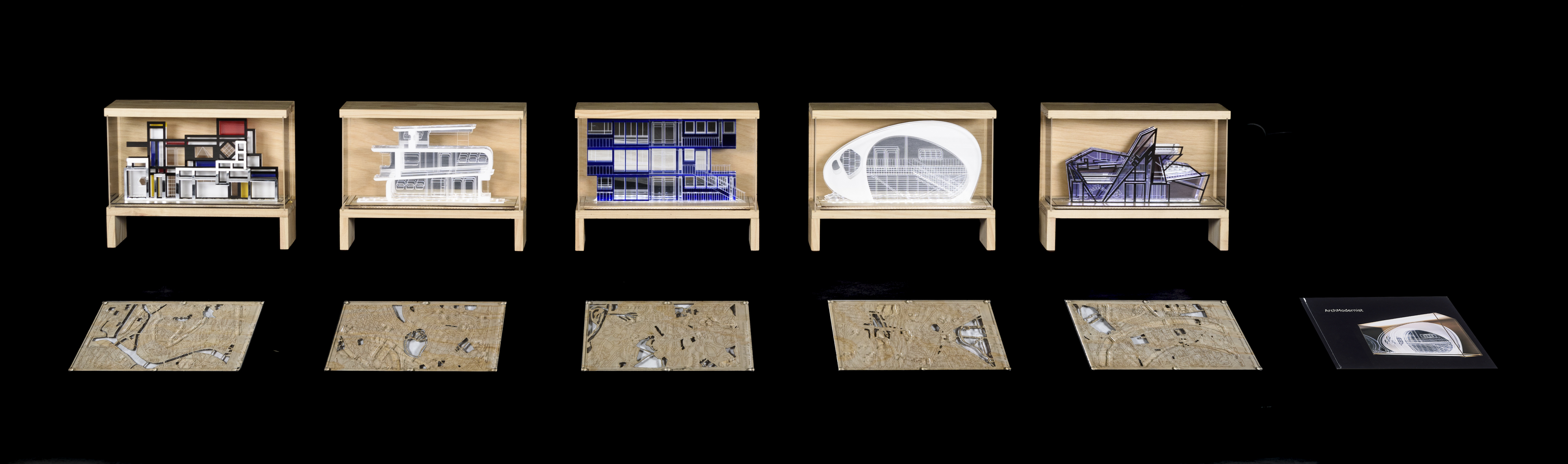 Five architectural sculptures made from acrylic, each in a timber case. 
