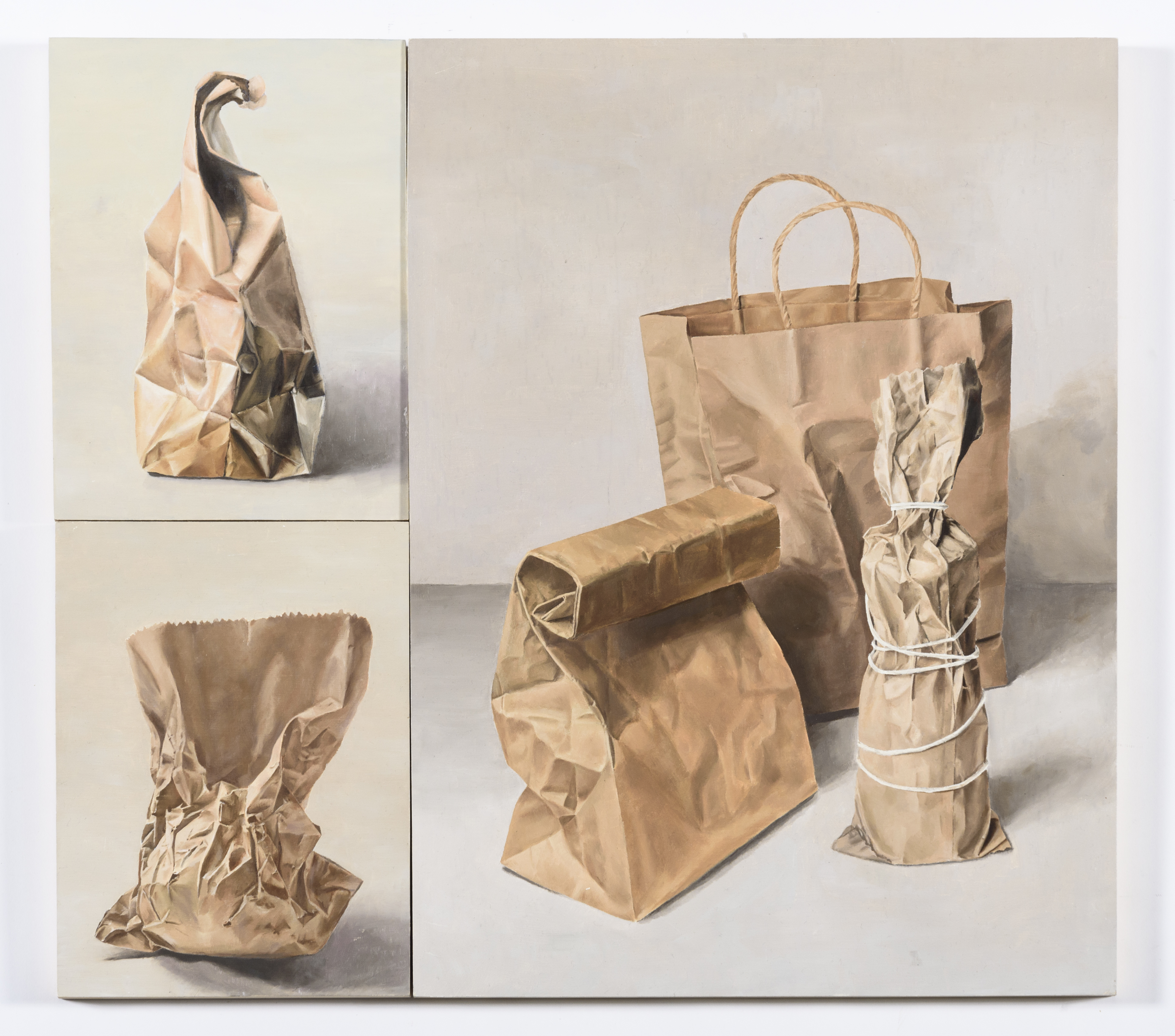One large and two smaller painting of crumpled brown paper bags of different typed and sizes.
