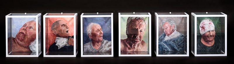 Six painted portraits of the artist's grandfather, each encased in a perspex box.