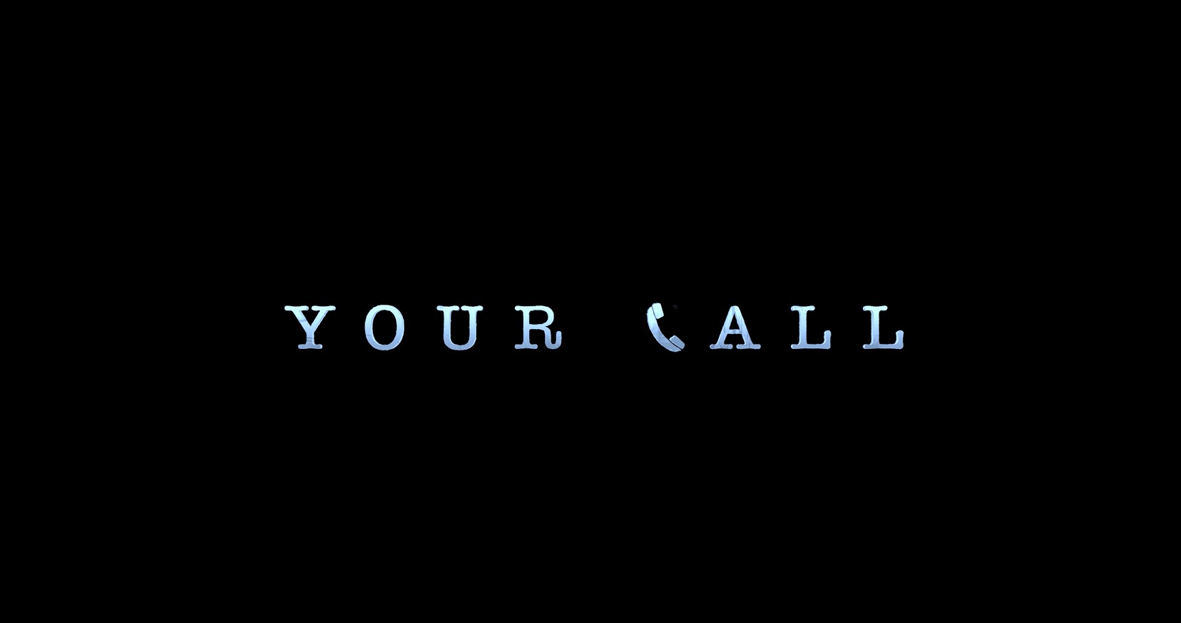 Still of title screen from student film featuring telephone symbol an text "Your Call"