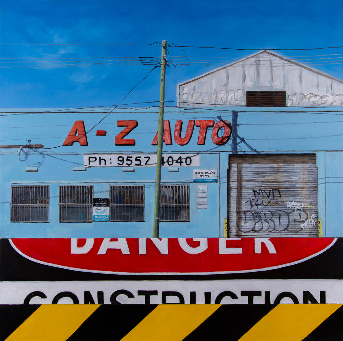 A painting of a blue building with the words A to Z Auto in red lettering.