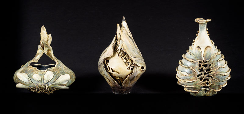 Three ceramic sculptures inspired by human and plant anatomies.